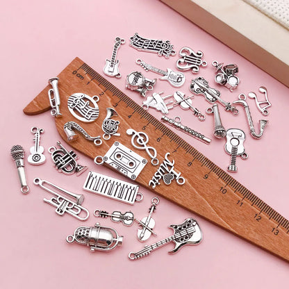 10-Piece Silver Music Instrument Charms – Guitar, Microphone & Note Pendants for DIY Jewelry