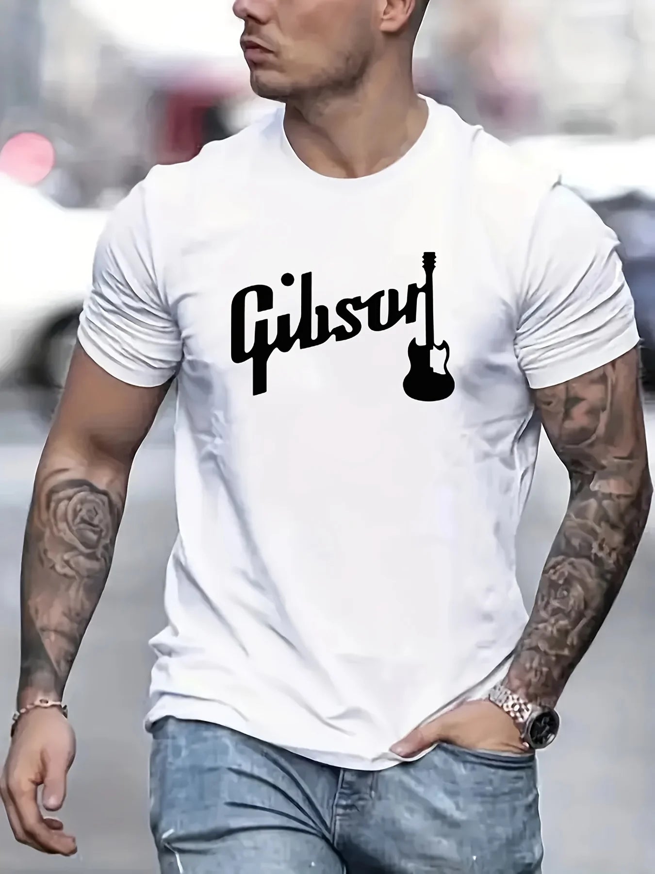 Close-up of the Gibson-style guitar print on the T-shirt, highlighting texture and detail.