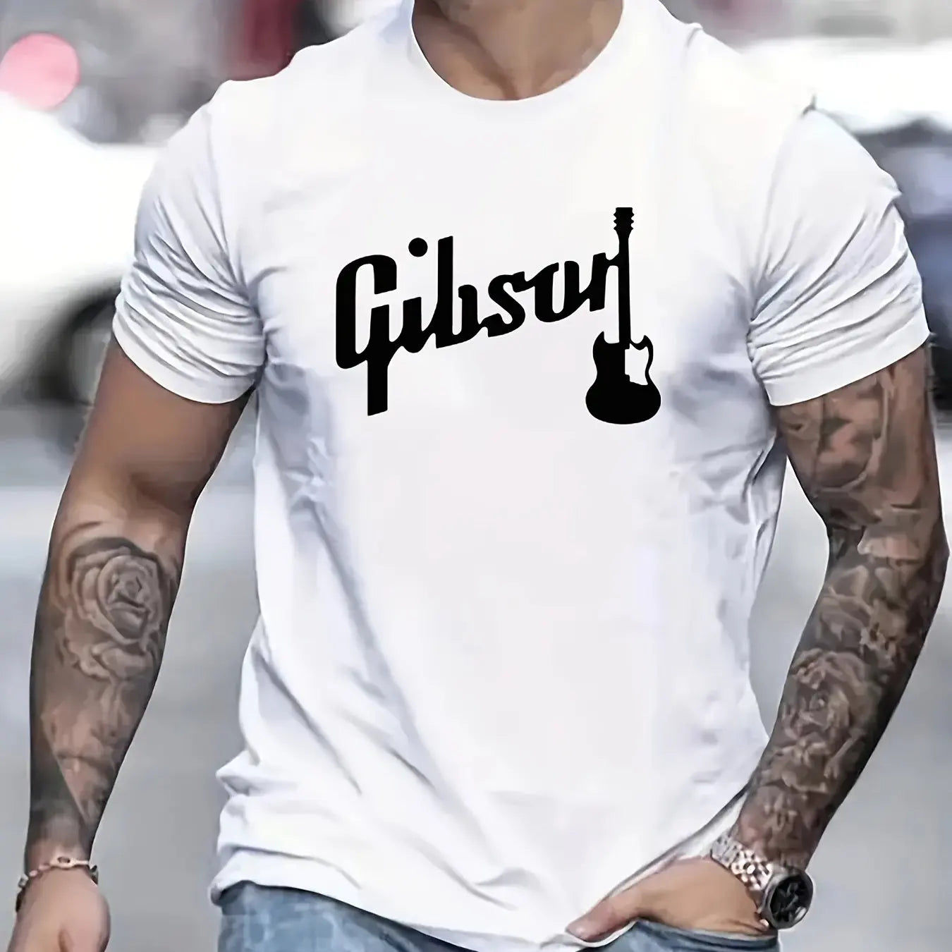 The tee displayed on a chair or next to a guitar — perfect for musicians.