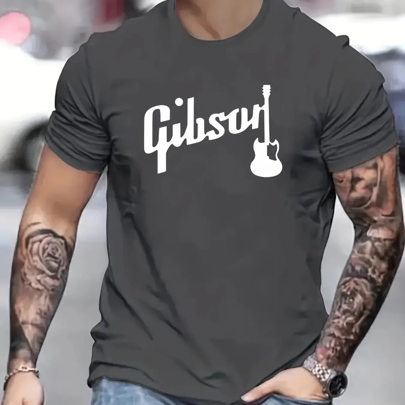 The Gibson guitar T-shirt paired with jeans or sunglasses for a relaxed look.