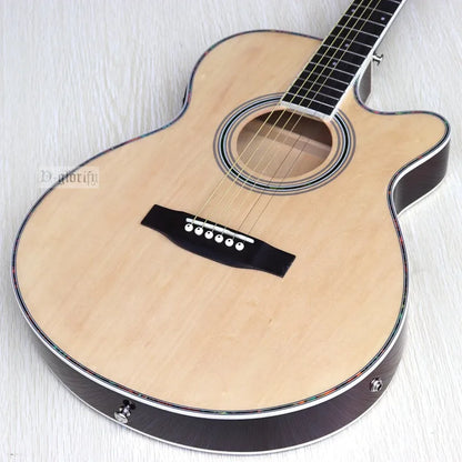 Thin-body acoustic-electric guitar standing on a portable stand or leaning in the gig bag.
