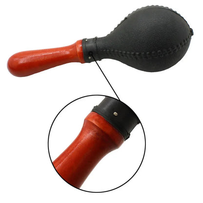 Maracas used in a classroom or music therapy session to illustrate educational benefits.