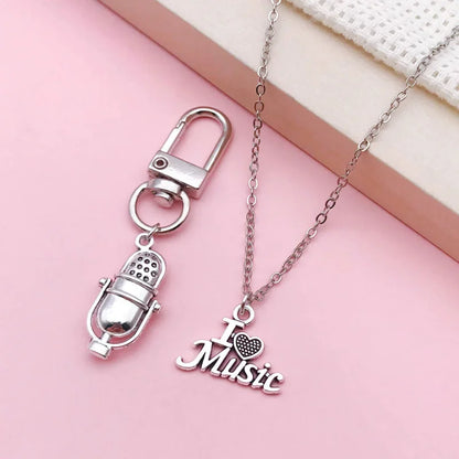 The music charms attached to jump rings and ready to be used in custom DIY jewelry projects.