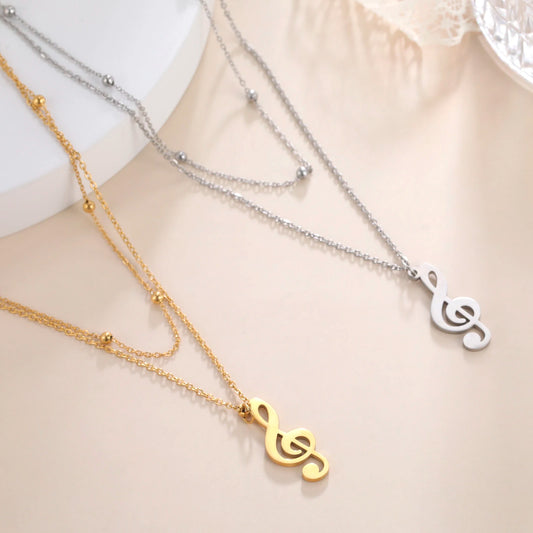 Front view of the stainless-steel music note pendant necklace with double-layer bead chain.