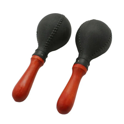 A professional pair of maracas shakers showing their ergonomic handles and sleek design.